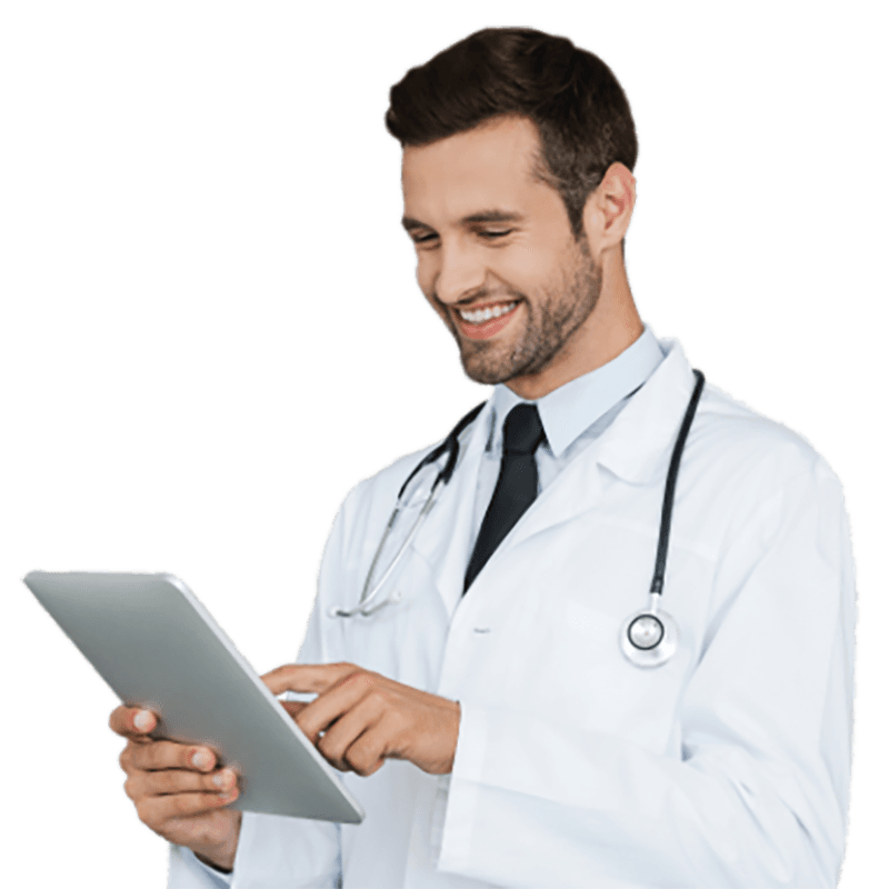 A smiling clinician reviewing a patient intake on a tablet